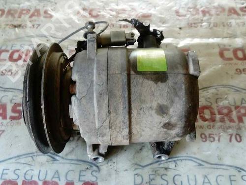 Used AC compressor FORD MAVERICK (UDS, UNS) 2.7 TD (100 hp) 19552538