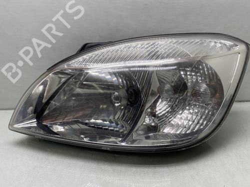 Used Left headlight KIA RIO II (JB) 1.4 16V (97 hp) 21264142
