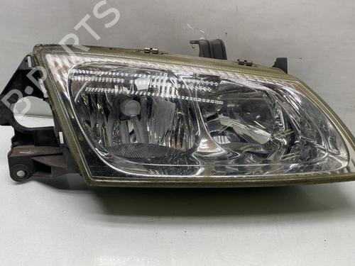 Used Right headlight NISSAN ALMERA II Hatchback (N16) 1.5 (90 hp) 23088405