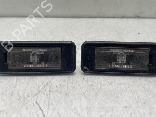 Used Licence plate light PEUGEOT 208 I (CA_, CC_) 1.2 VTI 82 (82 hp) 31594670