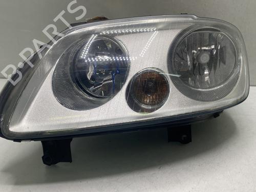 Used Left headlight VW TOURAN (1T1, 1T2) 1.9 TDI (105 hp) 31185393
