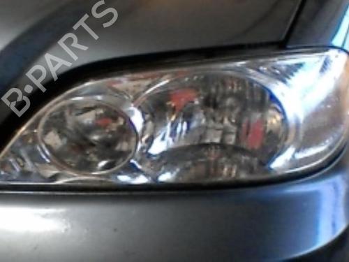 Used Left headlight KIA CARNIVAL II (GQ) 2.9 CRDi (144 hp) 21752607