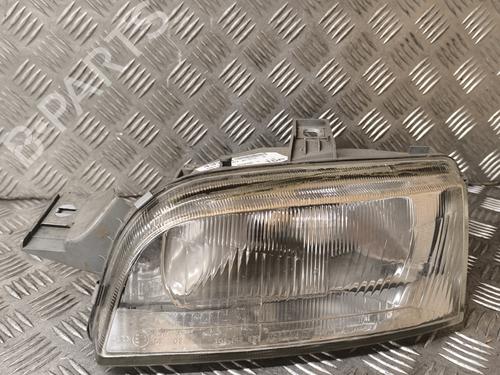 Used Left headlight FIAT PUNTO (176_) 60 1.2 (176AP, 176AR, 176AQ, 176BB) (60 hp) 21728703