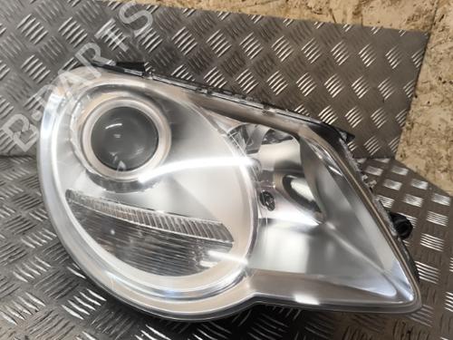Højre forlygte VW EOS (1F7, 1F8) 2.0 TDI (140 hp) 21749261