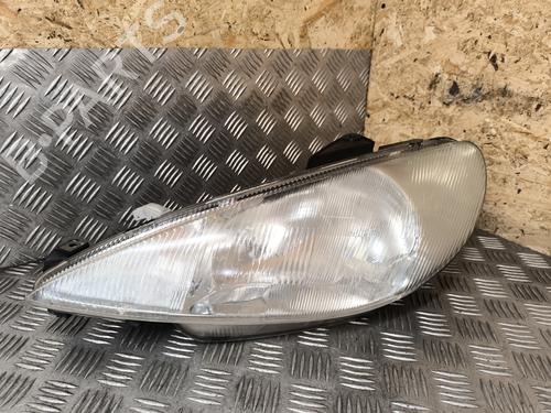 Used Left headlight PEUGEOT 206 Hatchback (2A/C) 1.4 i (75 hp) 26604830