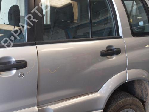 Dør venstre bak SUZUKI GRAND VITARA I (FT, HT) 2.0 HDI 110 16V 4x4 (SQ420D, TD83V) (109 hp) 21984361