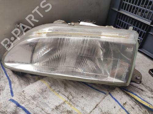 Left headlight RENAULT 19 II (B/C53_) 1.4 (B/C532) 7701036027