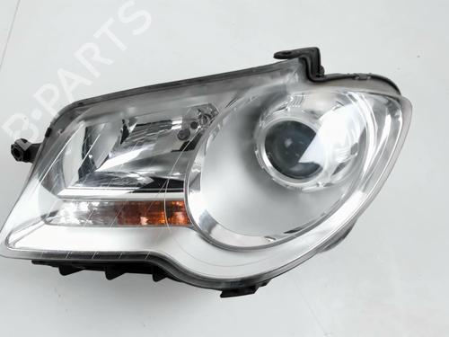 Used Left headlight VW TOURAN (1T1, 1T2) 1.9 TDI (105 hp) 29844309