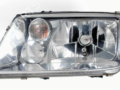 Used Left headlight VW BORA I (1J2) 1.9 TDI (90 hp) 20477496
