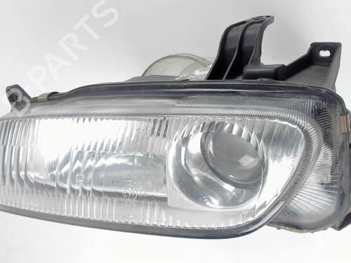 Used Left headlight MAZDA 323 P V (BA) 1.5 16V (88 hp) 22914561