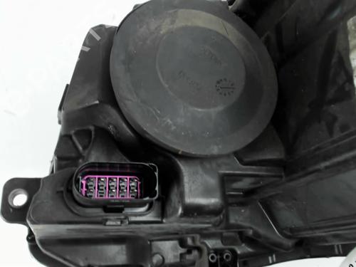 Right headlight VW EOS (1F7, 1F8) 2.0 TDI 16V | BP31932201C29 