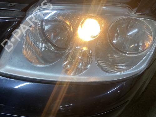 Used Left headlight VW TOURAN (1T1, 1T2) 2.0 TDI (136 hp) 31951083