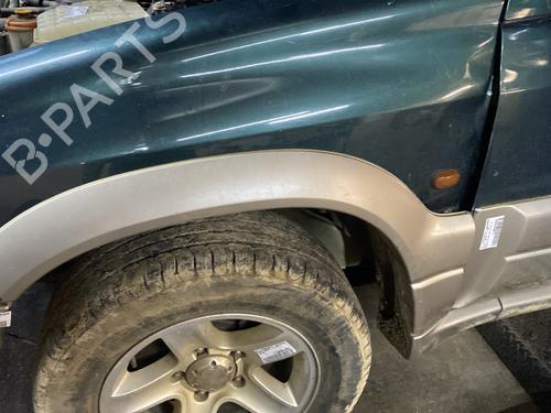 Used Front left wheel arch trim SUZUKI GRAND VITARA I (FT, HT) 2.0 TD 4x4 (SQ420D) (87 hp) 30939273
