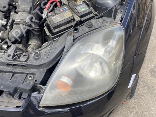 Used Left headlight FORD FIESTA V (JH_, JD_) 1.6 TDCi (90 hp) 27402947