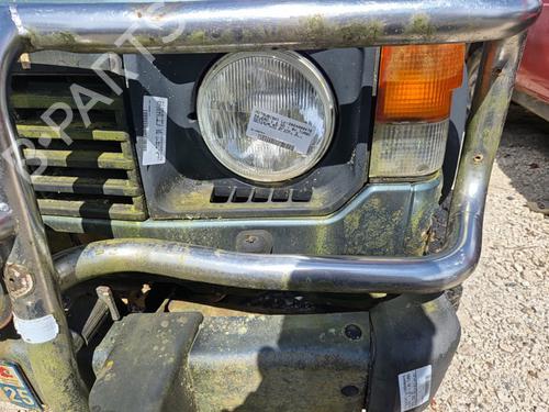 Forlygte dæksel Forlygte dæksel MITSUBISHI PAJERO I (L04_G, L14_G) 2.5 TD (L044G, L049G) (95 hp) 22124651 22124651