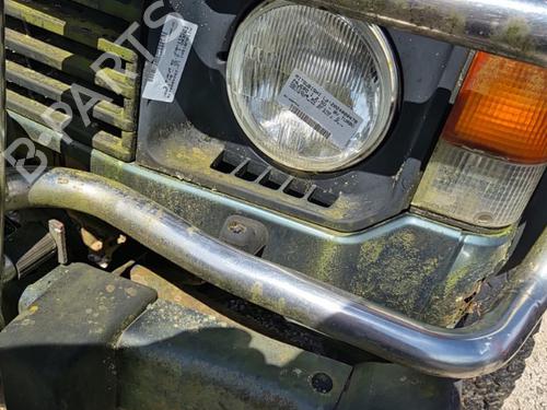 Used Headlight eyebrow MITSUBISHI PAJERO I (L04_G, L14_G) 2.5 TD (L044G, L049G) (95 hp) 22124651