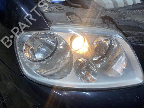 Used Right headlight VW TOURAN (1T1, 1T2) 2.0 TDI (136 hp) 31951082