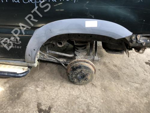 Used Rear left wheel arch trim NISSAN TERRANO II (R20) 2.7 TDi 4WD (125 hp) 22111501