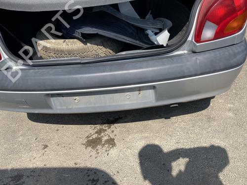 Used Rear bumper FORD FIESTA IV (JA_, JB_) 1.3 i (60 hp) 26557439