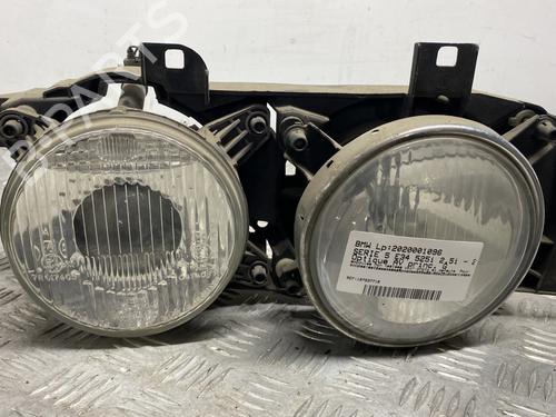 Used Left headlight BMW 5 (E34) 525 i 24V (192 hp) 26934511