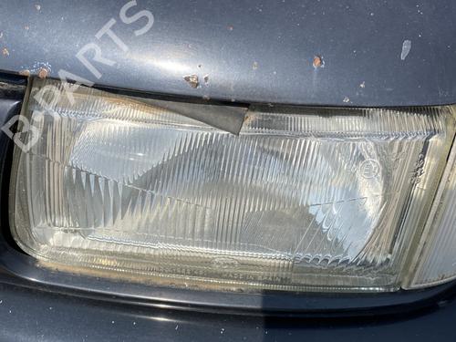 Left headlight VW POLO III (6N1) 64 1.9 D | BP26557555C28 
