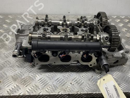 Used Cylinder head PEUGEOT 208 I (CA_, CC_) 1.2 VTI 82 (82 hp) 27809534