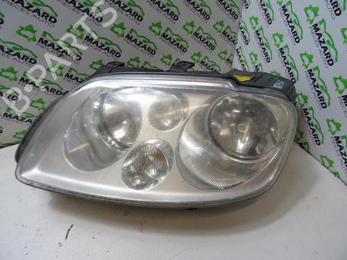Used Left headlight VW TOURAN (1T1, 1T2) 2.0 TDI (136 hp) 21965226