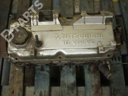 Used Cylinder head Cylinder head MITSUBISHI CARISMA Saloon (DA_) 1.8 16V GDI (DA2A) (125 hp) 10979812 10979812