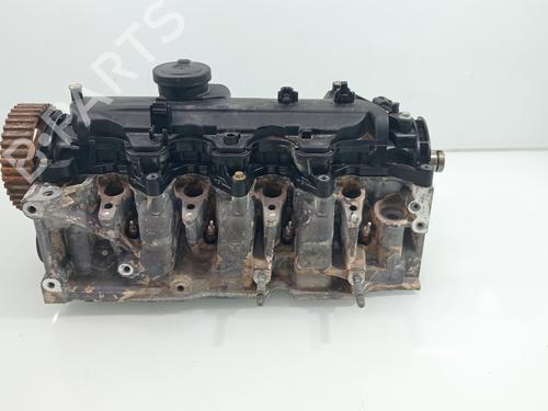 Used Cylinder head RENAULT SCÉNIC III (JZ0/1_) [2008-2016]  28524124