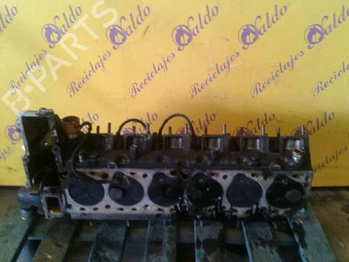 Used Cylinder head OPEL OMEGA B Estate (V94) 2.5 TD (F35, M35, P35) (131 hp) 10979814