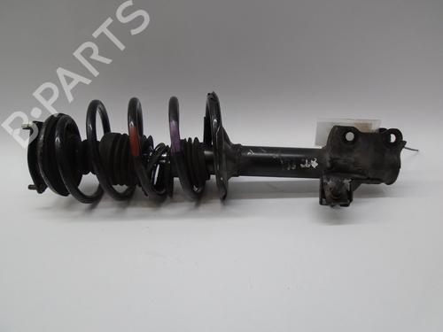 Used Left front shock absorber NISSAN PRIMERA Hatchback (P11) 2.0 TD (90 hp) 13537802
