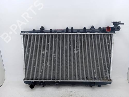 Used Water radiator Water radiator NISSAN PRIMERA Traveller (W10) 1.6 i (102 hp) 25724387 25724387