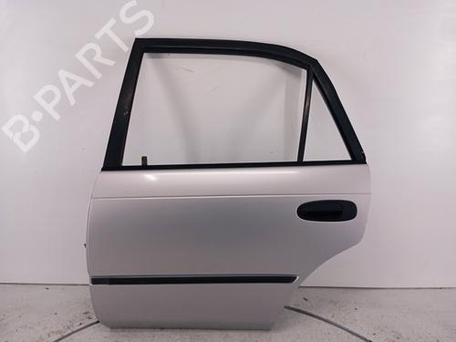 Dør venstre bak Dør venstre bak TOYOTA COROLLA Estate (_E10_) 1.3 XLI 16V (EE101_, EE101R) (88 hp) 34227847 34227847