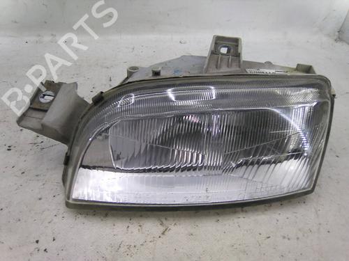 Used Left headlight FIAT PUNTO (176_) 55 1.1 (54 hp) 19812597