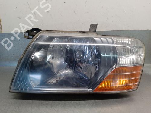 Phare gauche MITSUBISHI PAJERO III (V7_W, V6_W) 3.2 Di-D (V68W) (160 hp) 32081092