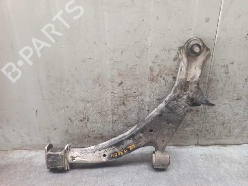 Used Left front suspension arm HONDA LOGO (GA) 1.3 (GA3) (65 hp) 7628824