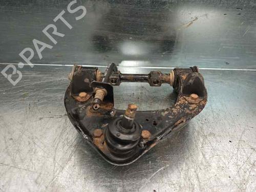 Left front suspension arm MITSUBISHI L200 (K7_T, K6_T, K5_T) 2.5 TD 4WD (K74T) | BP6704657M12 