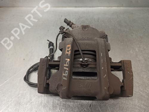 Used Left front brake caliper BMW 1 (F21) 116 d (116 hp) 16322319