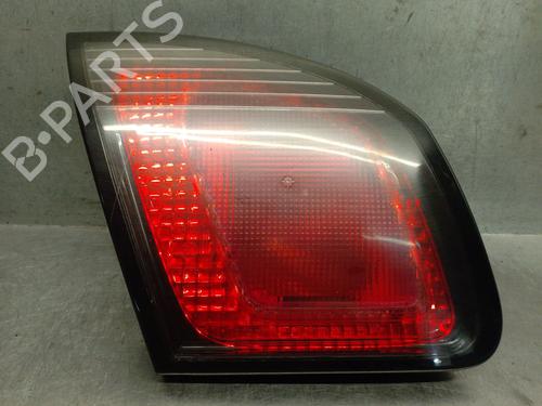 Used Left tailgate light NISSAN PRIMERA (P11) 2.0 TD (90 hp) 31210425