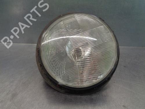 Used Left headlight LAND ROVER DEFENDER Pick Up (L316) 2.5 Td5 4x4 (L316) (122 hp) 10377480