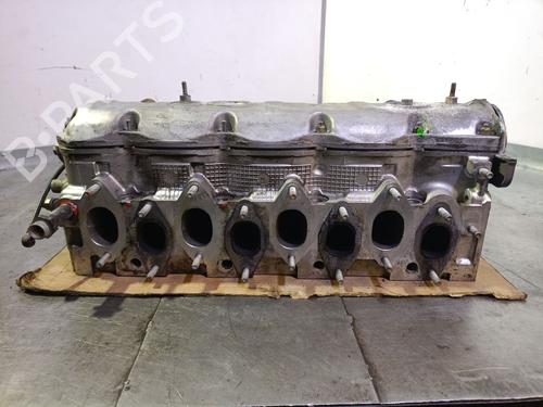 Used Cylinder head IVECO DAILY II Van 35-10 (15034111, 15034204, 15034211, 15034215, 15034217,... (103 hp) 30588380