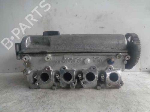Used Cylinder head VW GOLF III (1H1) 1.6 (101 hp) 10979100