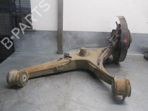 Left rear steering knuckle VW TRANSPORTER T5 Van (7HA, 7HH, 7EA, 7EH) 1.9 TDI | BP9274025M27 