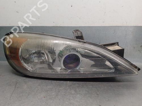 Used Right headlight NISSAN PRIMERA (P11) 2.0 TD (90 hp) 31210423