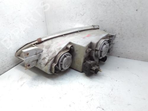 Right headlight HYUNDAI COUPE I (RD) 2.0 16V | BP20569480C29 