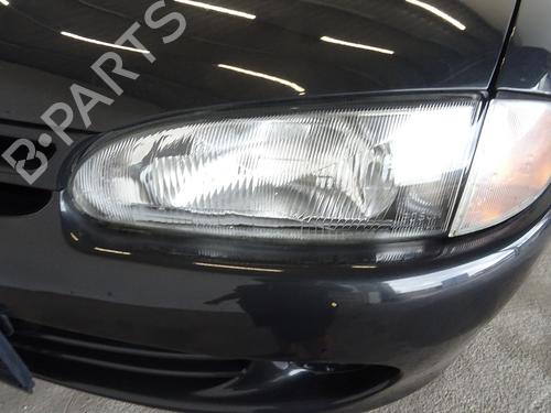 Left headlight PROTON PERSONA 400 Hatchback (C9_C, C9_S) 415 GLi/GLSi MB883223 Bosch