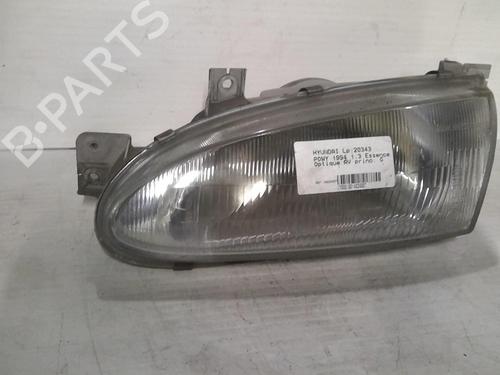 Left headlight HYUNDAI ACCENT I (X-3) 1.3 i 12V | BP20369015C28 