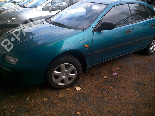 Left headlight MAZDA 323 P V (BA) 1.5 16V | BP20370764C28 