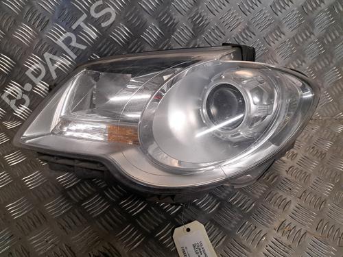 Used Left headlight VW TOURAN (1T1, 1T2) 1.9 TDI (105 hp) 28588409