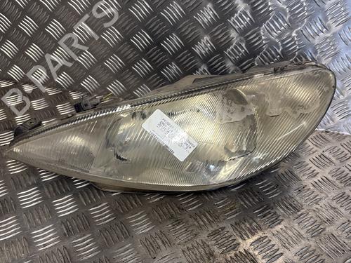Used Left headlight PEUGEOT 206+ (2L_, 2M_) 1.4 HDi eco 70 (68 hp) 32268557